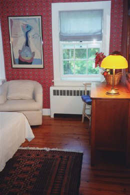 The living room with fireplace, cable TV, DVD and garden views in Barnstable, Cummaquid Mid Cape Cod