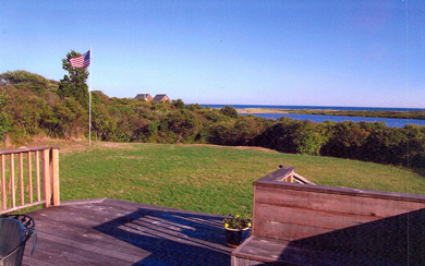 Magnificent view of pond and ocean from deck and living room in Chilmark Martha's Vineyard