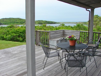 Magnificent view of pond and ocean from deck and living room in Chilmark Martha's Vineyard