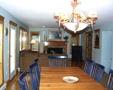 Sit back and relax in this spacious living - dining area by deck in Oak Bluffs Martha's Vineyard