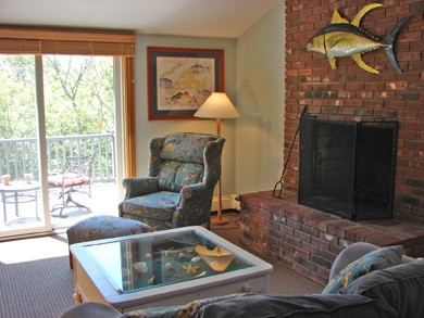...sitting area, fireplace, television and private master deck in Oak Bluffs Martha's Vineyard